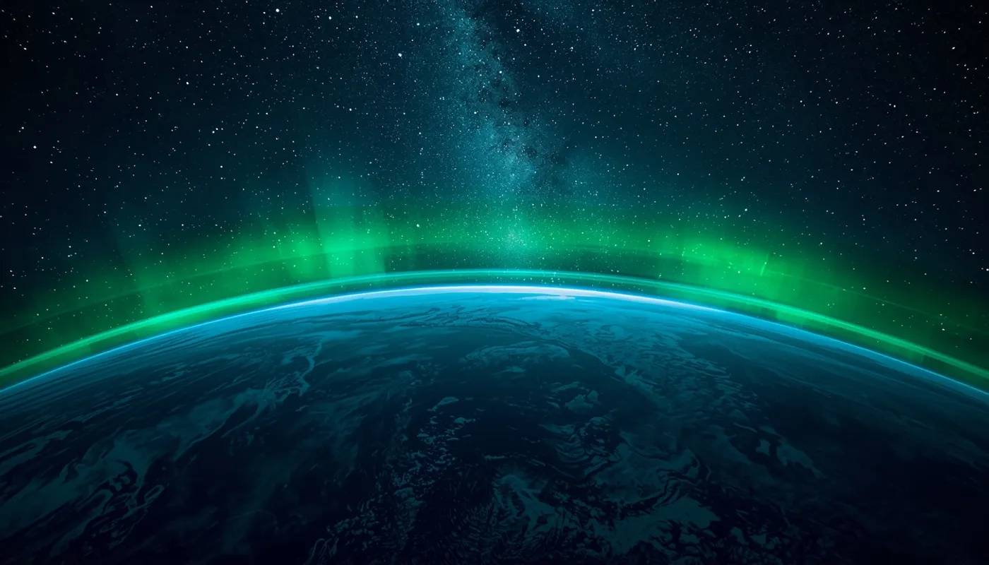 Earth from space with emerald aurora borealis and Milky Way - we are part of the cosmos